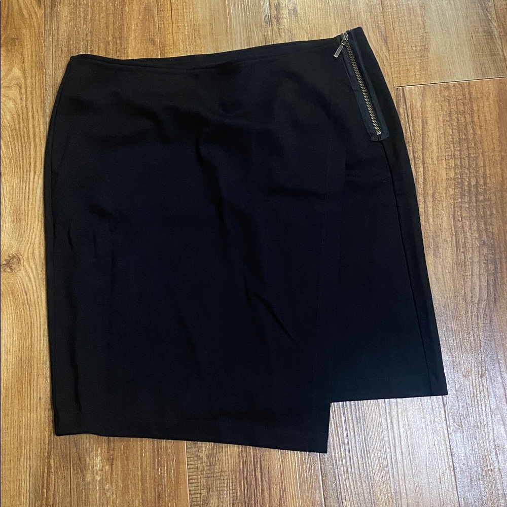 CAbi Black Assemetric skirt with accent zipper. Size 12